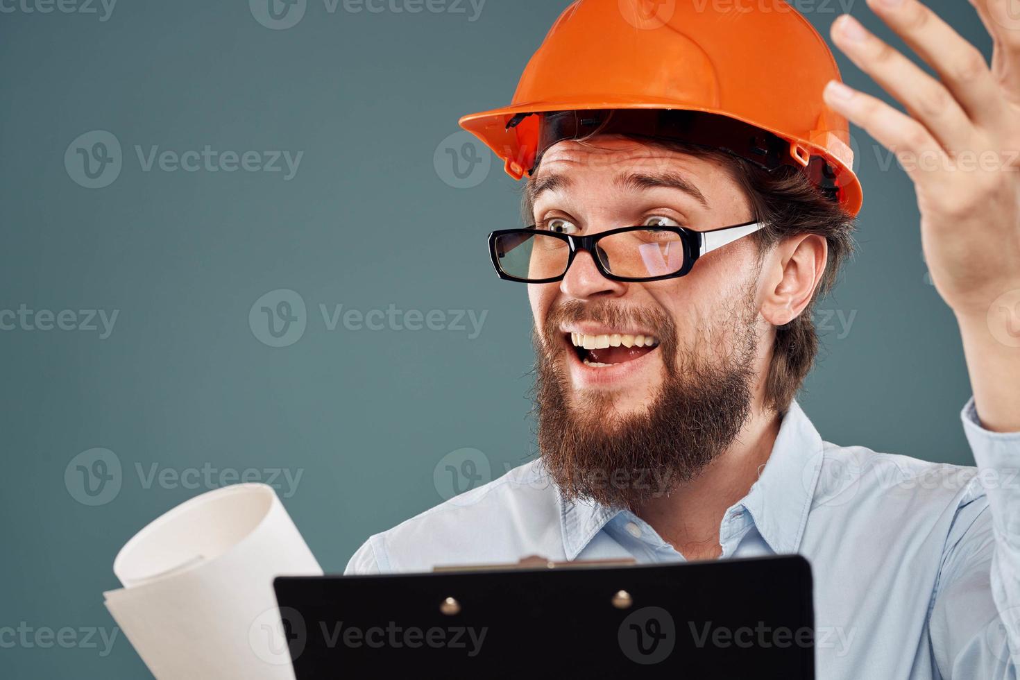 emotional worker in orange paint paperwork construction lifestyle fun photo