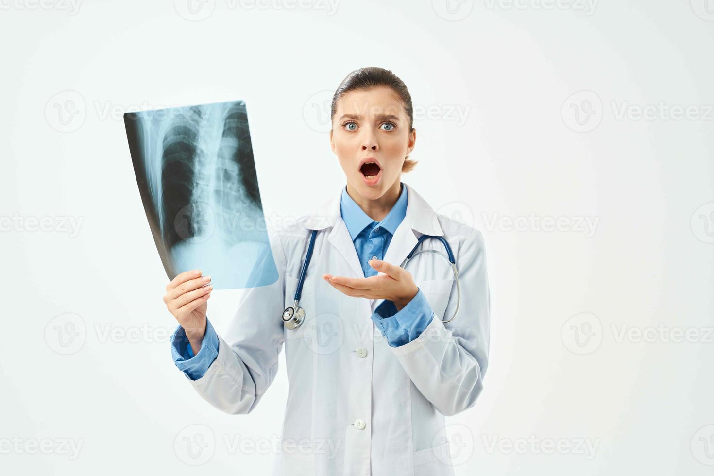 emotional female doctor x-ray hand gesture diagnostics photo