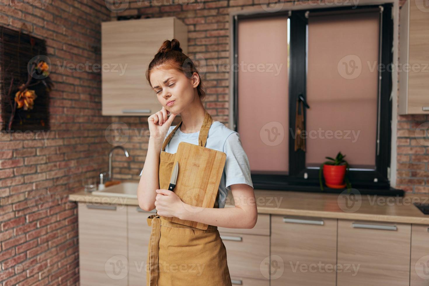 beautiful woman houses in the kitchen cutting board apartments Lifestyle photo