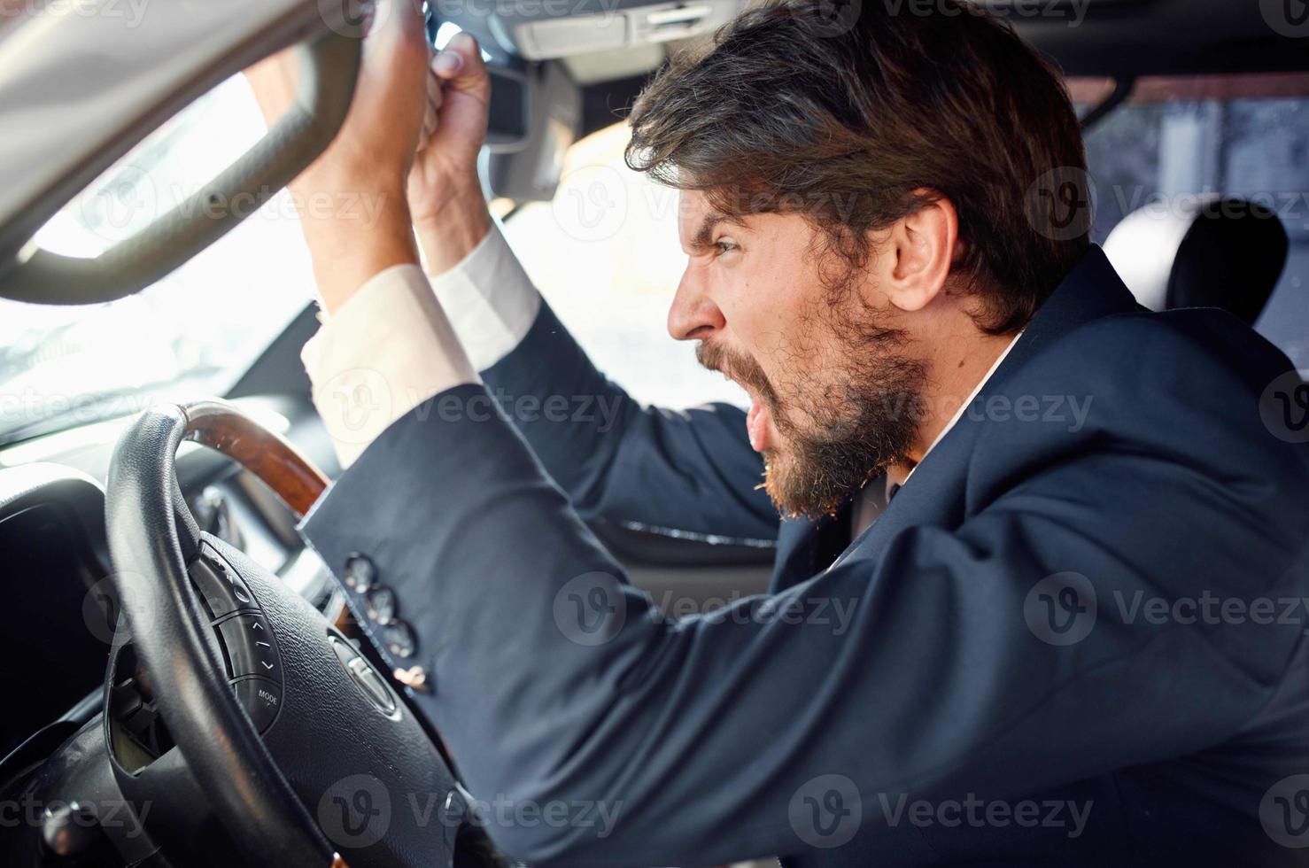 emotional man Driving a car trip luxury lifestyle service photo