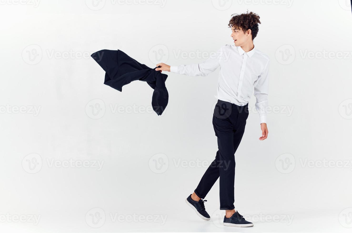 kinky guy in suit blazer showing fashion self confidence photo