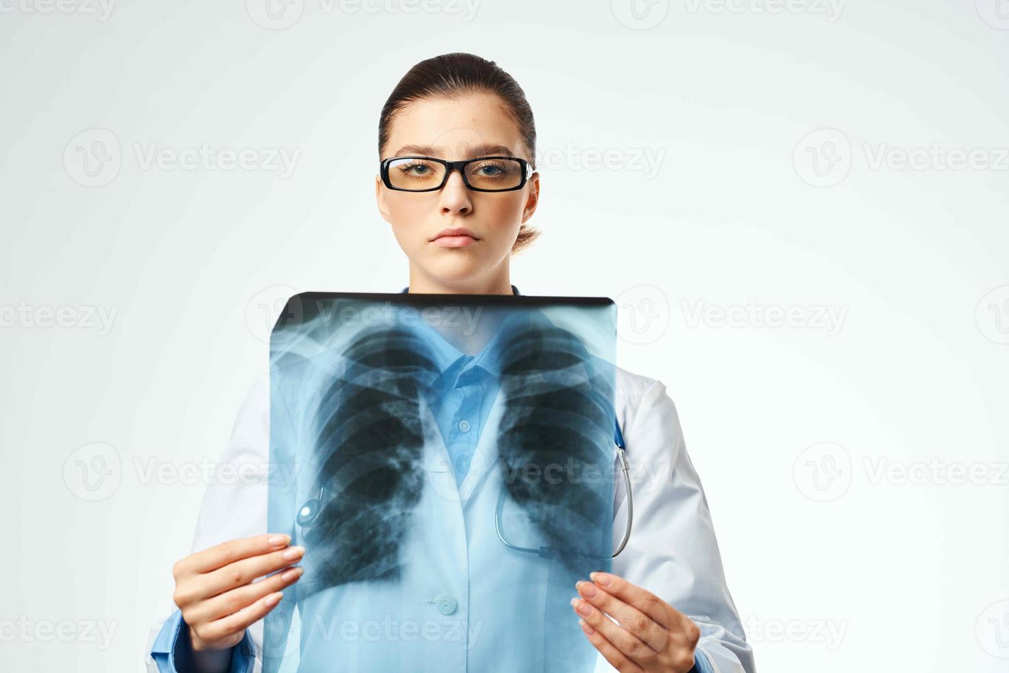 medical worker in white coat x-rays professional examination photo