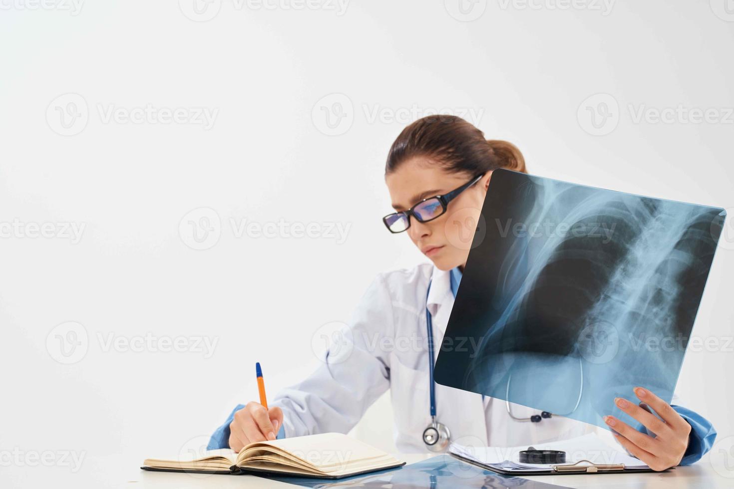 female doctor in white coat x-ray diagnostics medicine photo