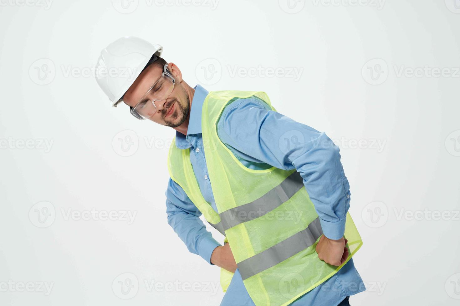 man in white helmet blueprints builder light background photo