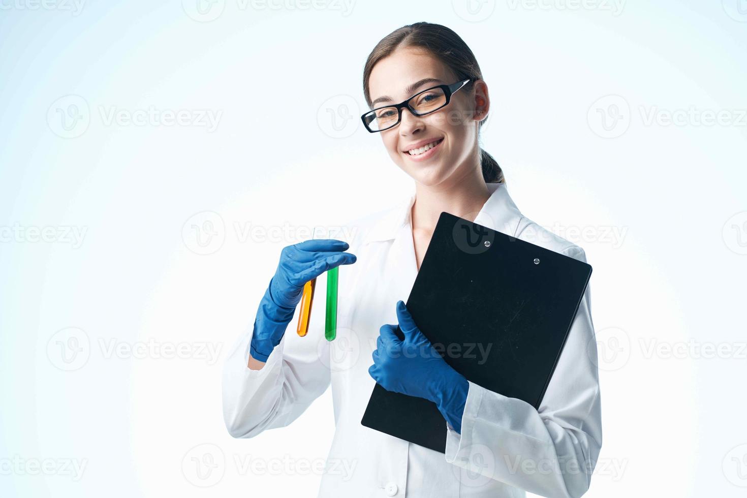 Woman in white coat technology science chemical solution biology photo