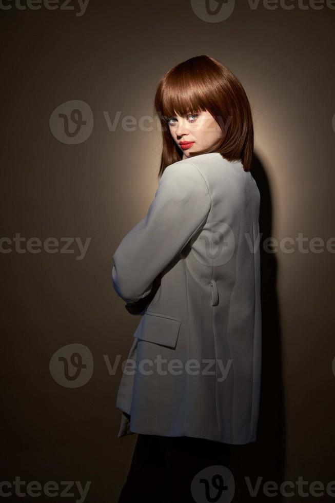 brunette in fashion clothes look at the camera room photo