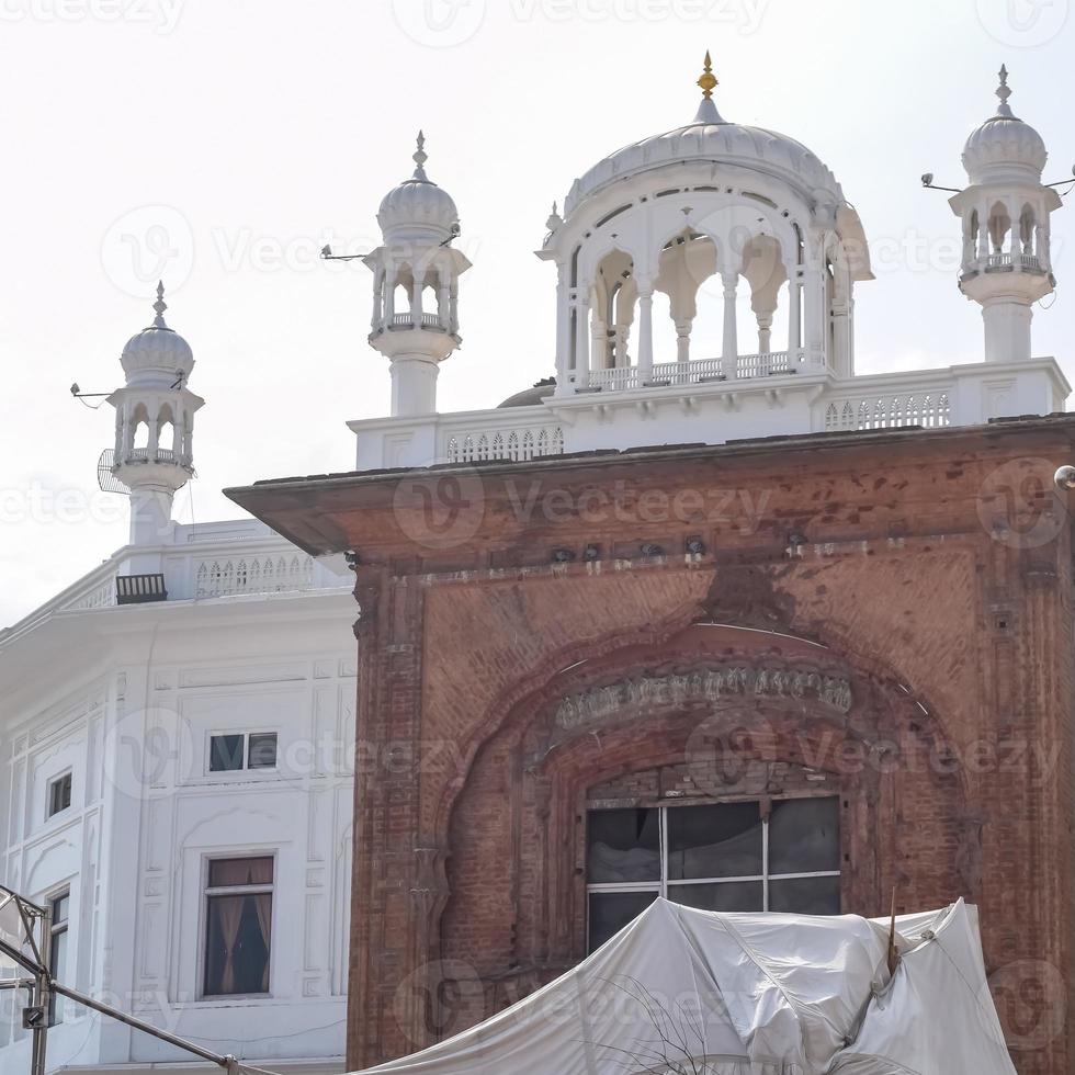 View of details of architecture inside Golden Temple - Harmandir Sahib in Amritsar, Punjab, India, Famous indian sikh landmark, Golden Temple, the main sanctuary of Sikhs in Amritsar, India photo