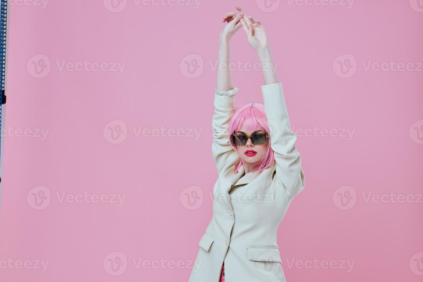 Beauty Fashion woman modern style pink hair sunglasses color background unaltered photo