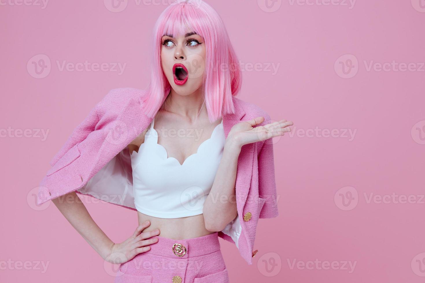 Portrait of a charming lady bright makeup pink hair glamor Studio Model unaltered photo