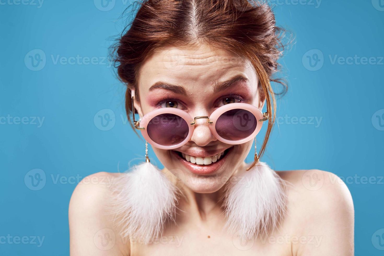 cheerful woman with bare shoulders round glasses decoration emotions photo