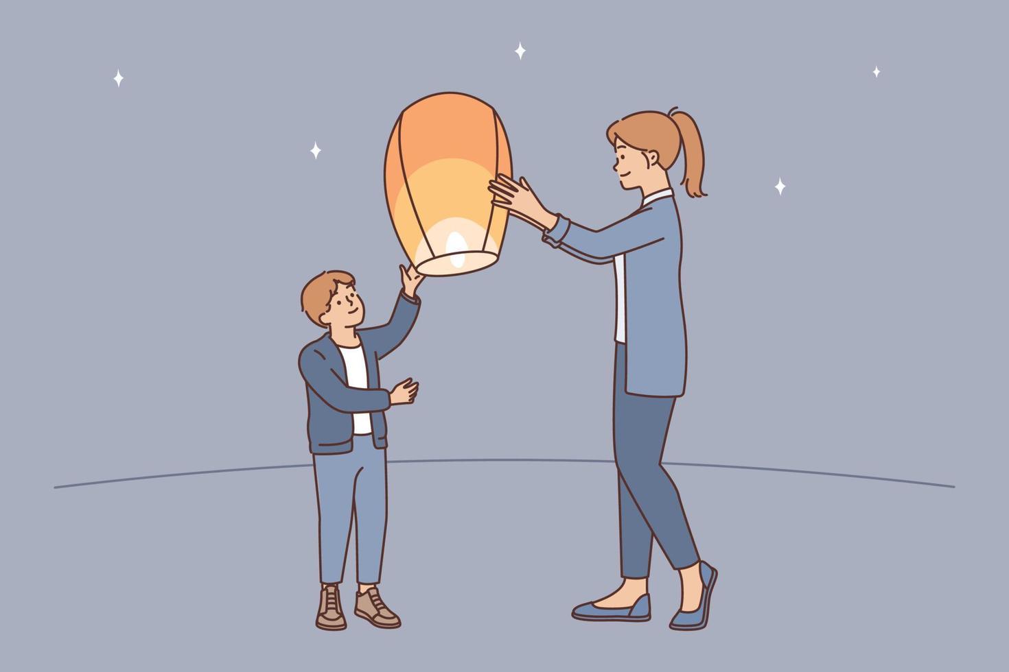 Teenage boy together with older sister, launch air fire lantern standing on street under starry sky. Mom helps son send air lantern in flight enjoy communication with child on summer evening vector