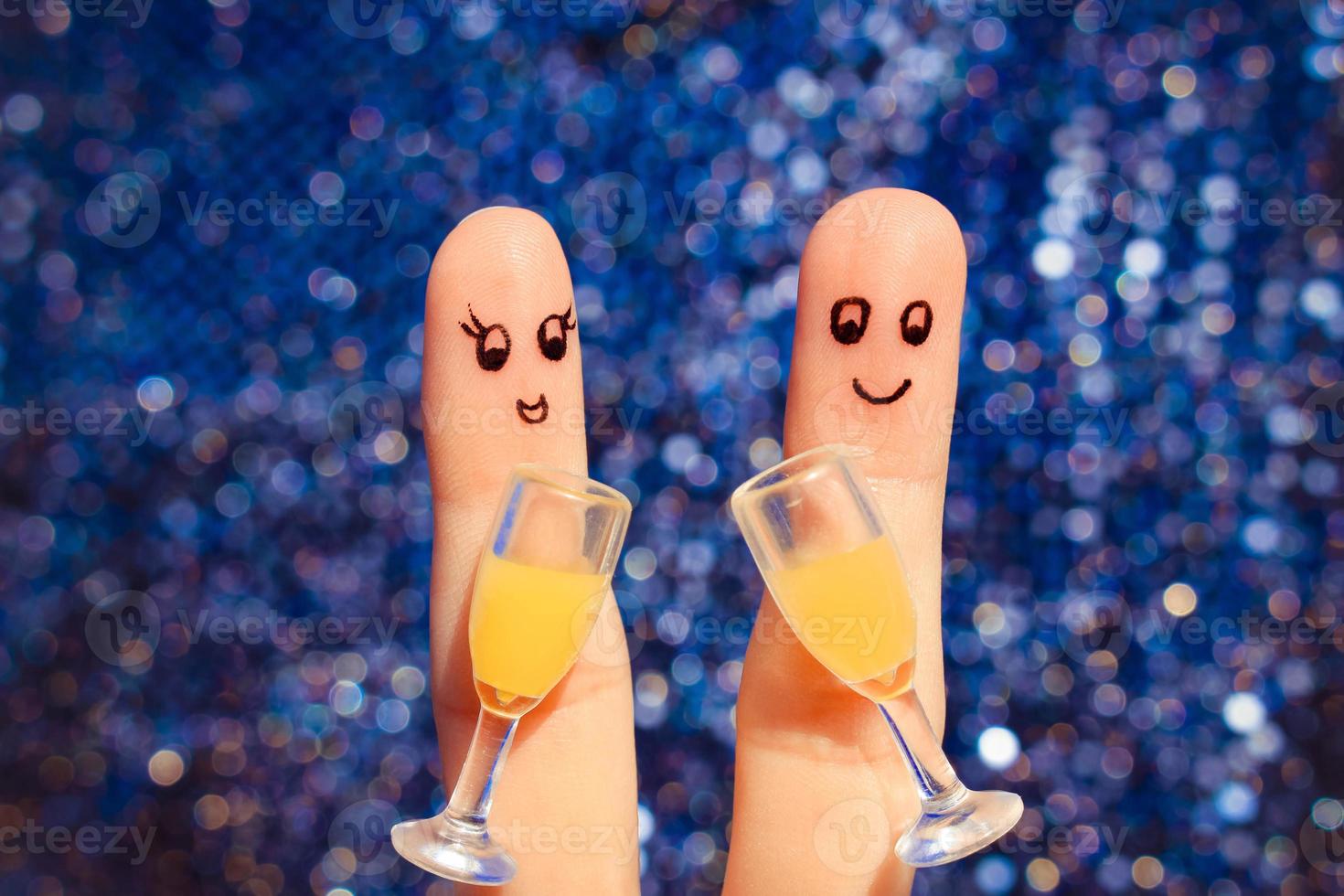 Finger art of a Happy couple. Couple making good cheer. photo