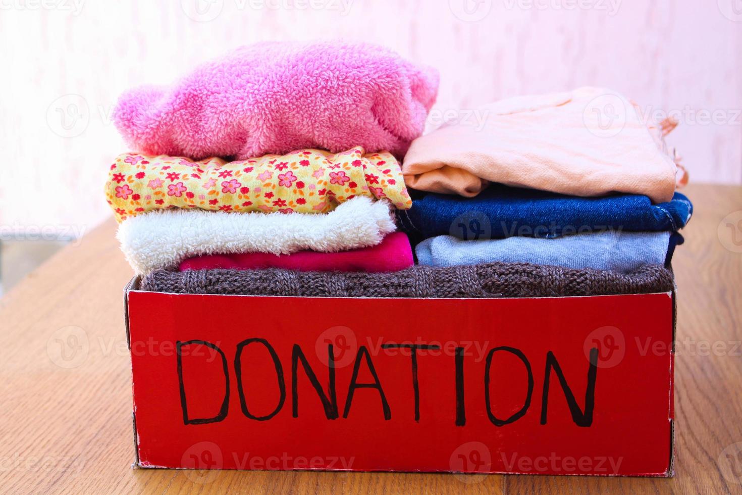 Donation box with clothes photo