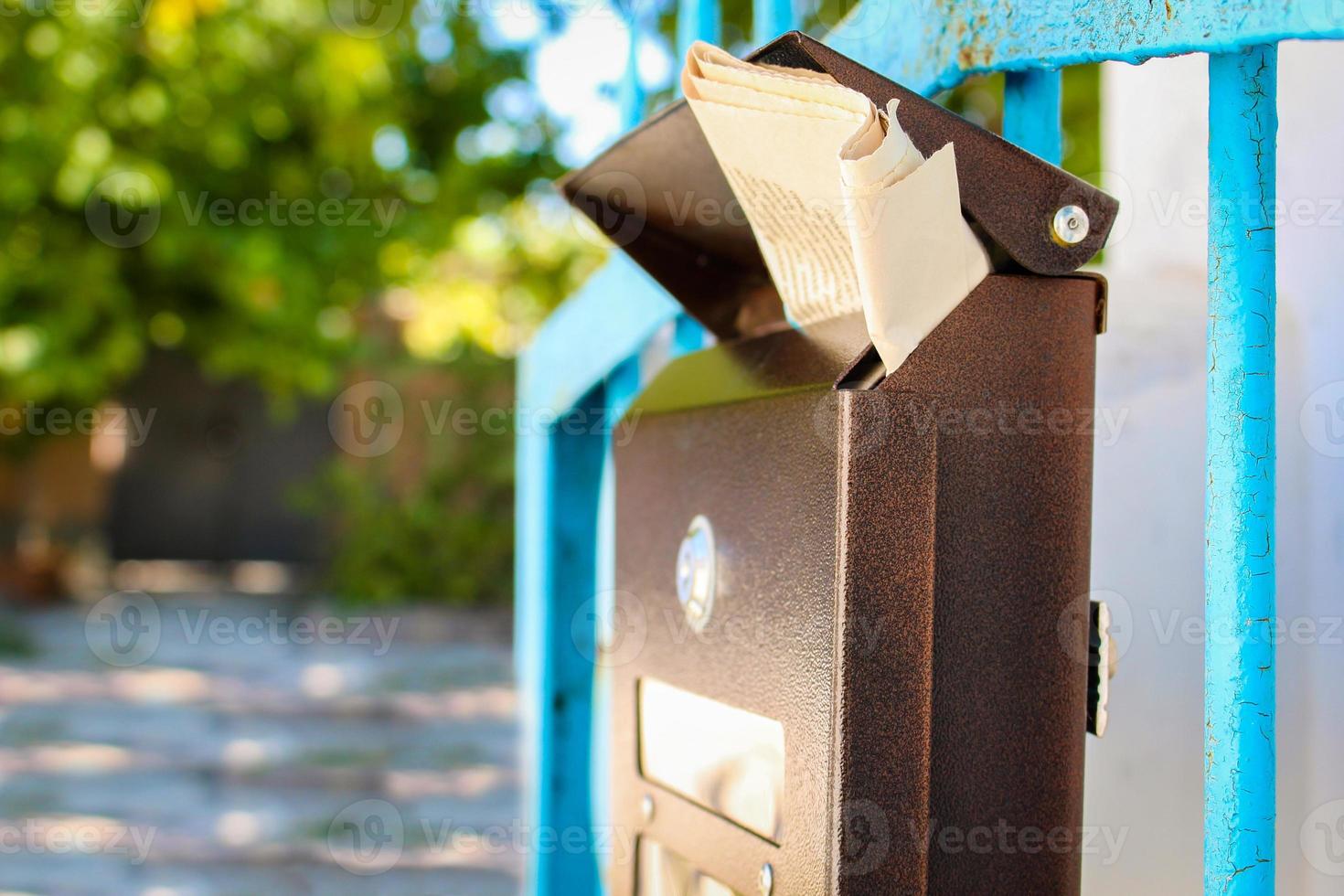 Mailbox with newspaper photo