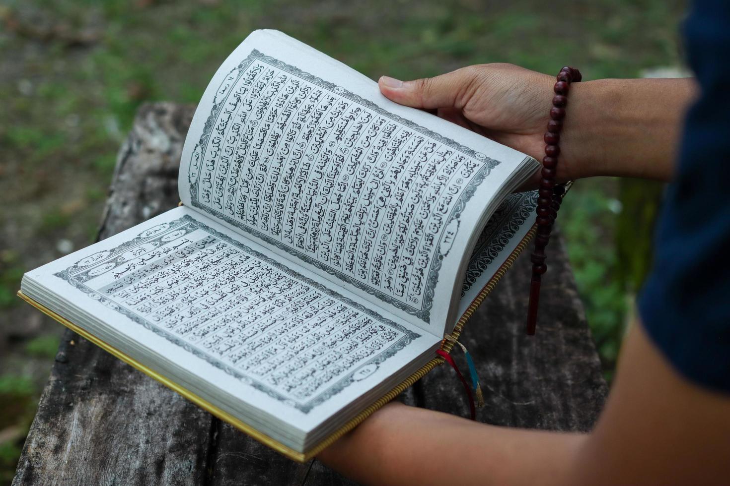 reading the Koran photo