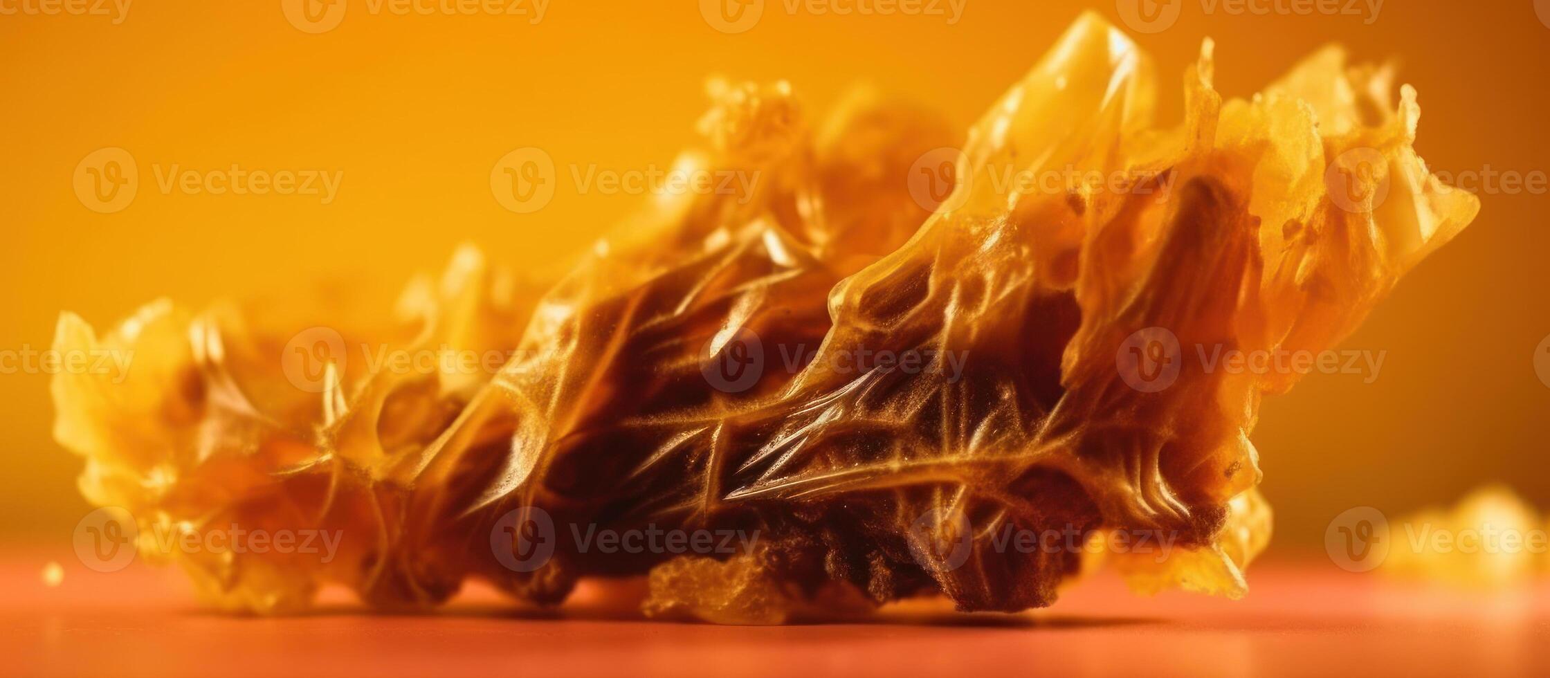 pieces golden cannabis wax, strong resin extract thc photo