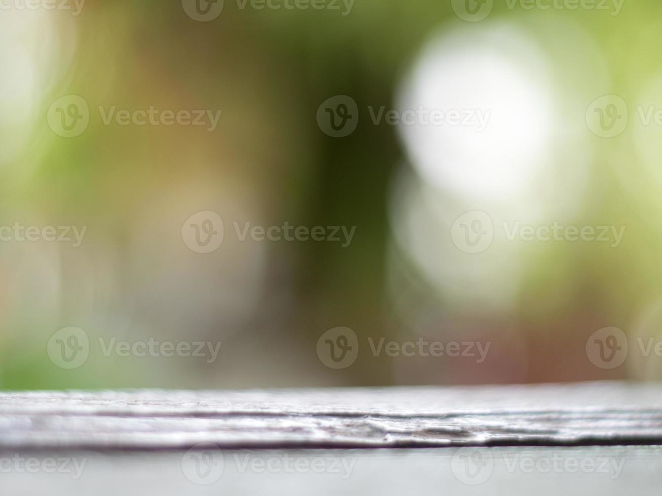 Natural outdoors bokeh background in green and yellow tones, Blurred green tree leaf background with bokeh photo