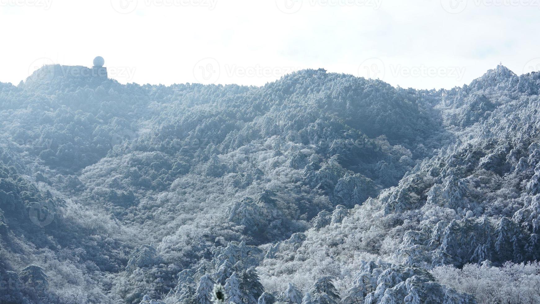 The beautiful frozen mountains view coverd by the white snow and ice in winter photo