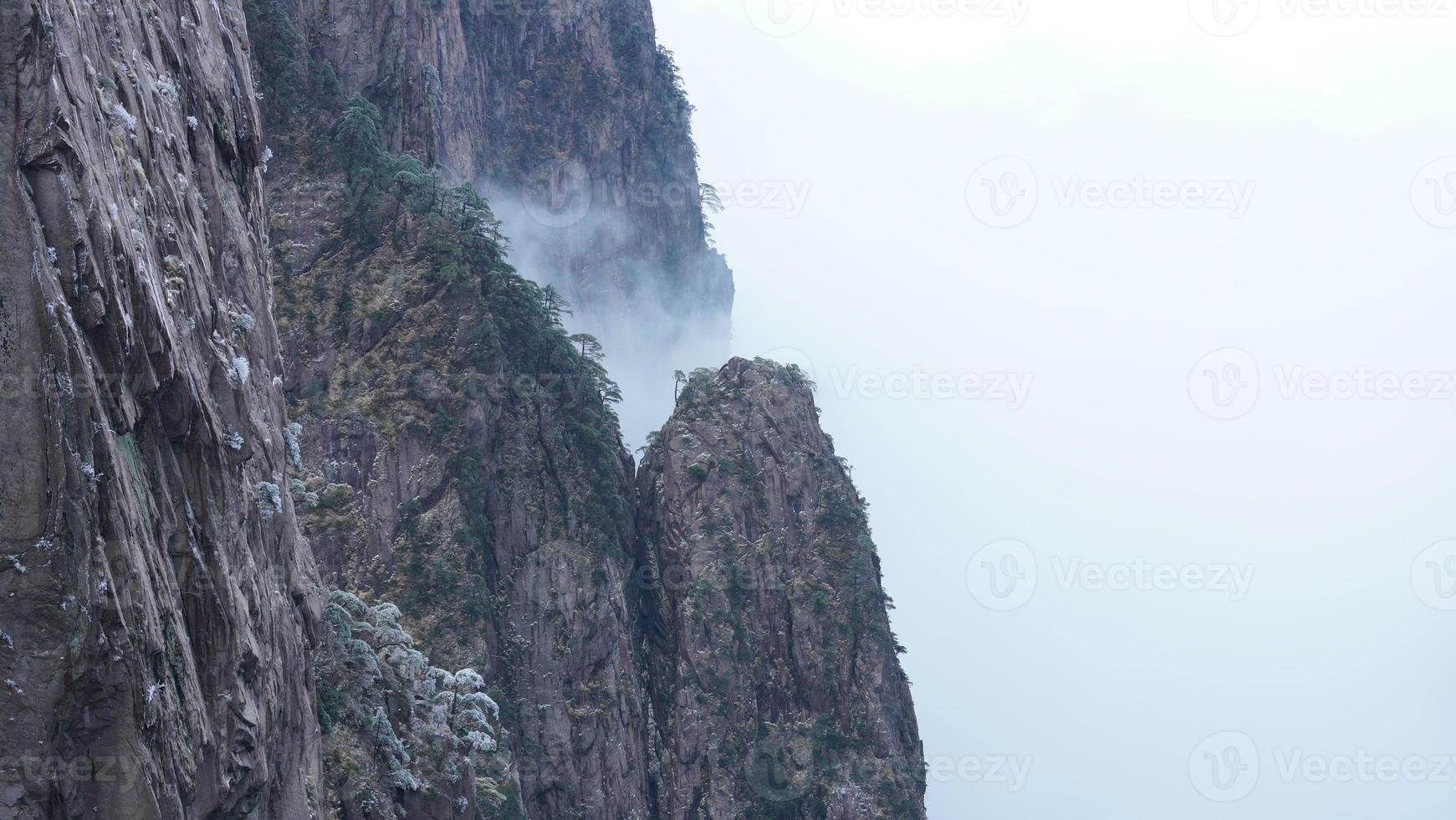 The beautiful frozen mountains view coverd by the white snow and ice in winter photo