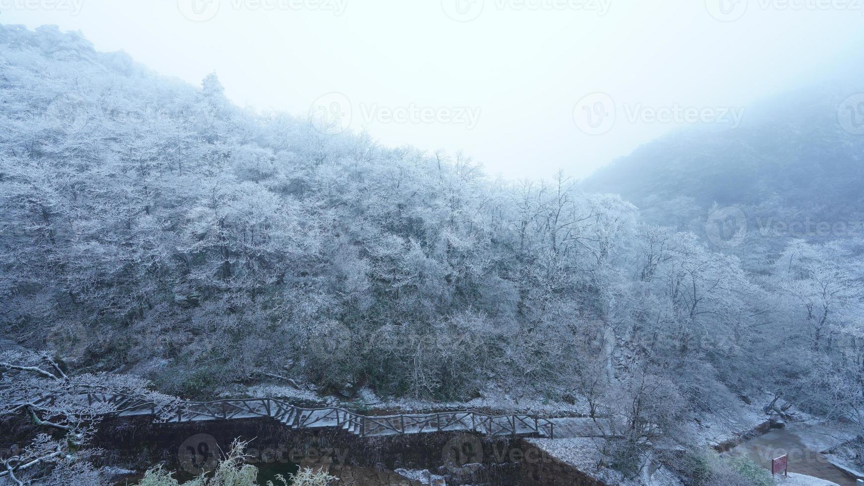 The beautiful frozen mountains view coverd by the white snow and ice in winter photo