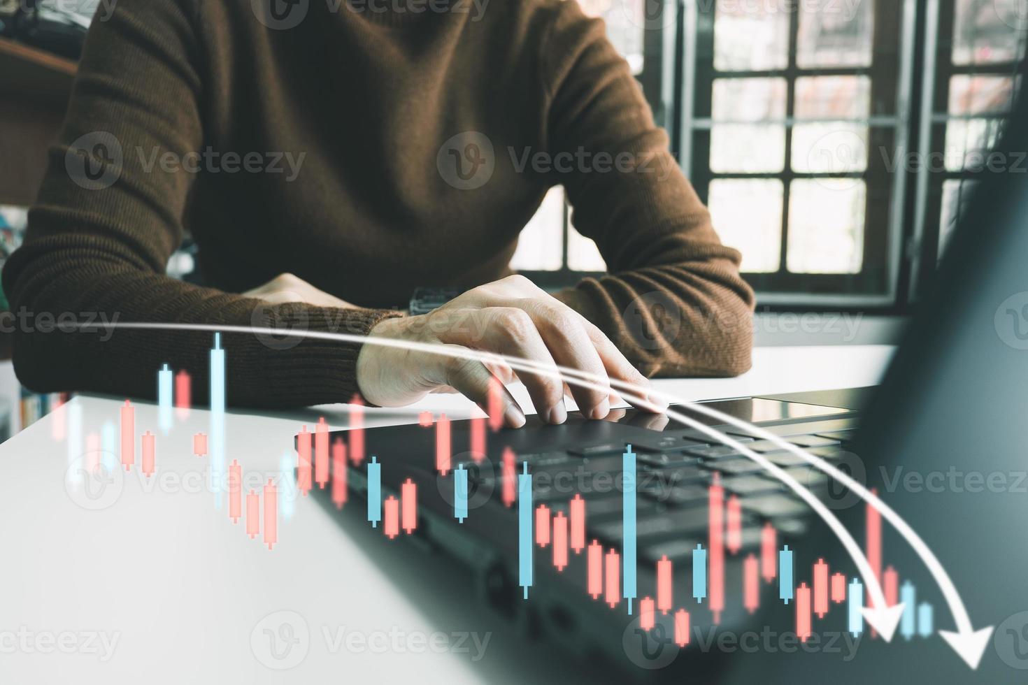 Investor analyze stock chart with laptop, businessman forecast and analysis graph in Bearish downtrend, economic slowdown, inflation crisis, loan interest rise, trade war finance, covid-19 impact. photo