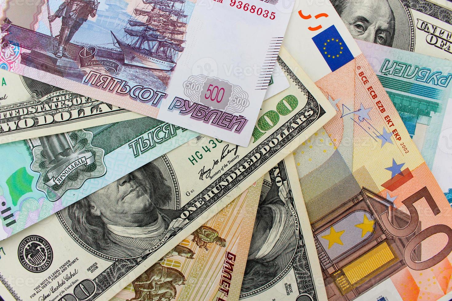 Money from different countries dollars, euros, hryvnia, rubles photo