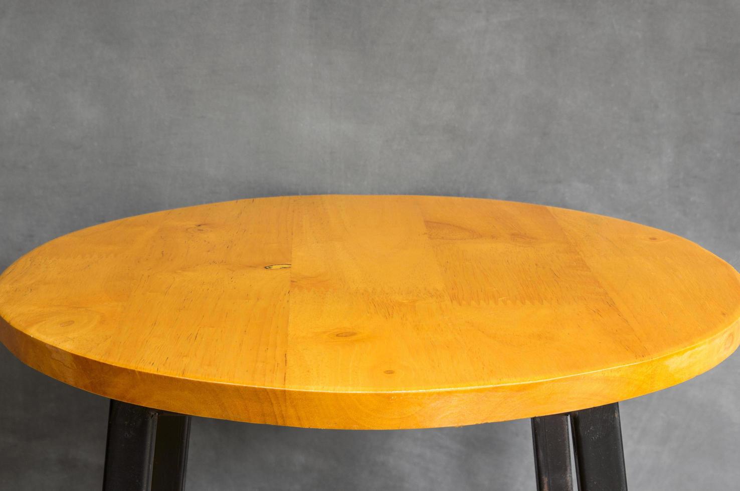 Empty of wood table top on gray concrete wall photo