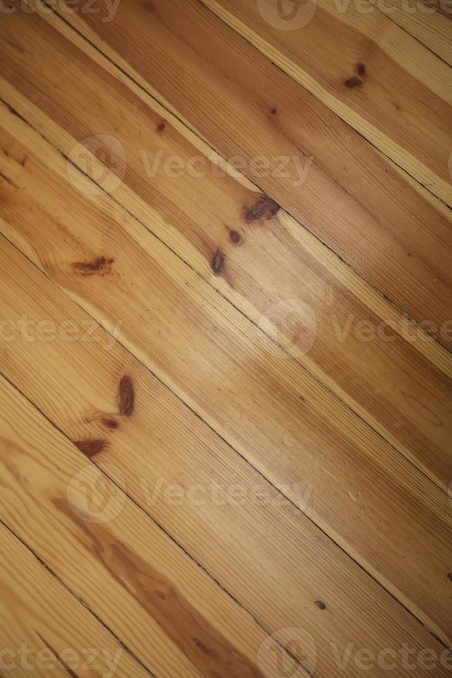 Close-up diagonal texture of a wooden floor. photo