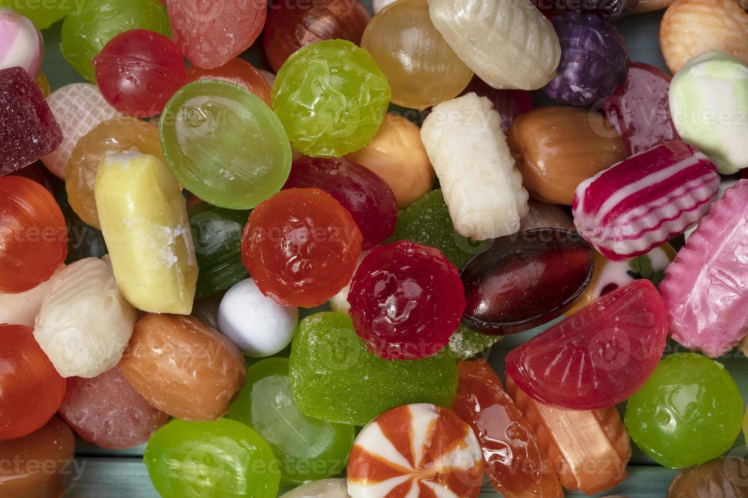 Many sweets. Multi-colored caramel close-up. Sweets. photo