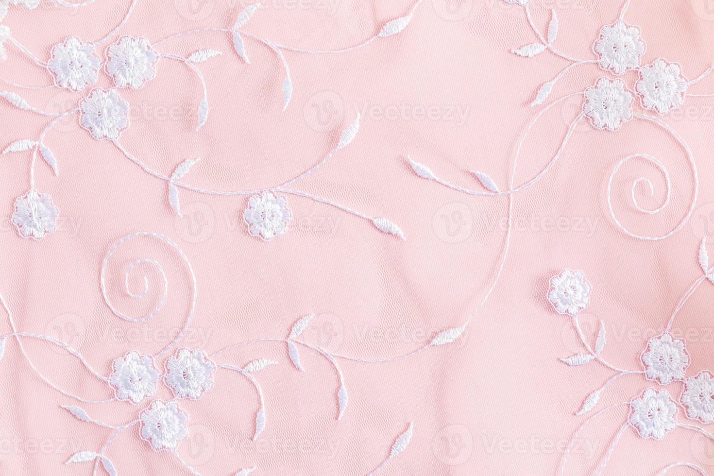 pastel background with white embroidered colors. delicate background texture. festive , wedding background. cloth. photo