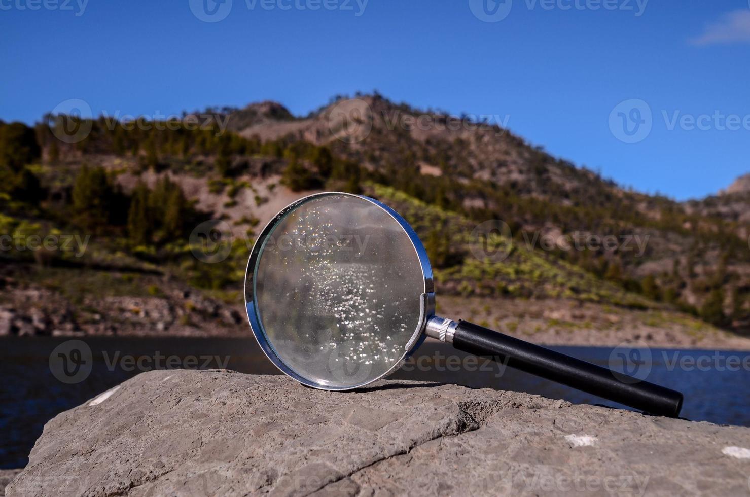 Loupe on a rock photo