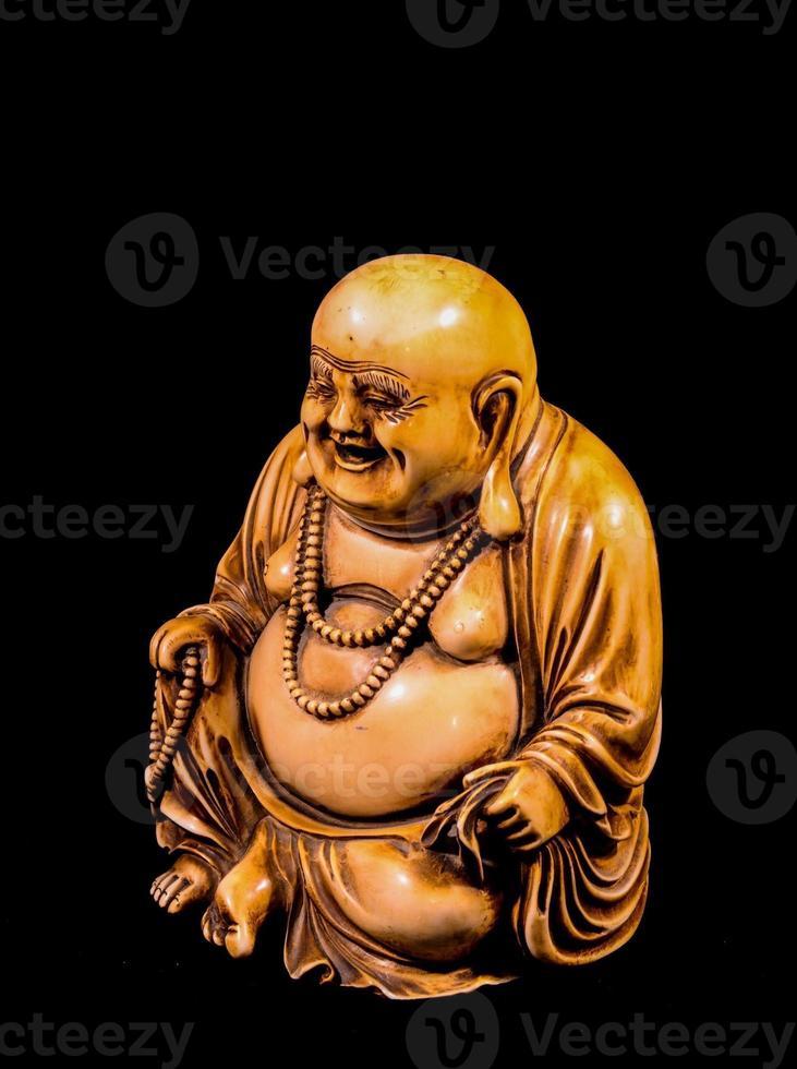 Buddha isolated on black background photo