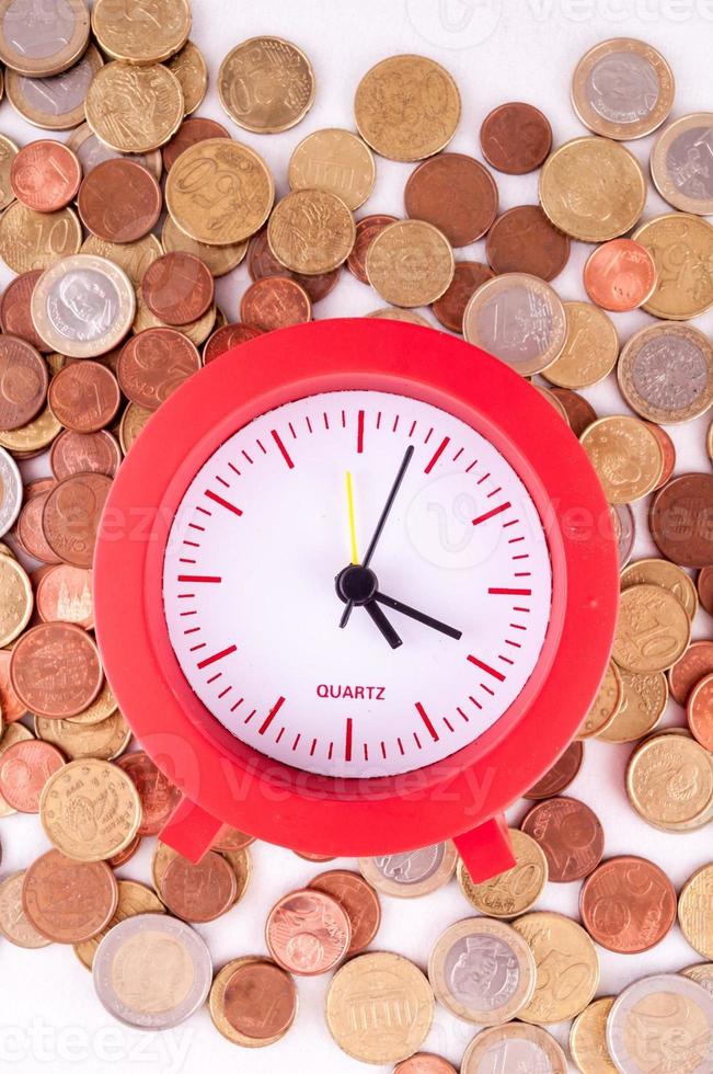 Clock and coins photo