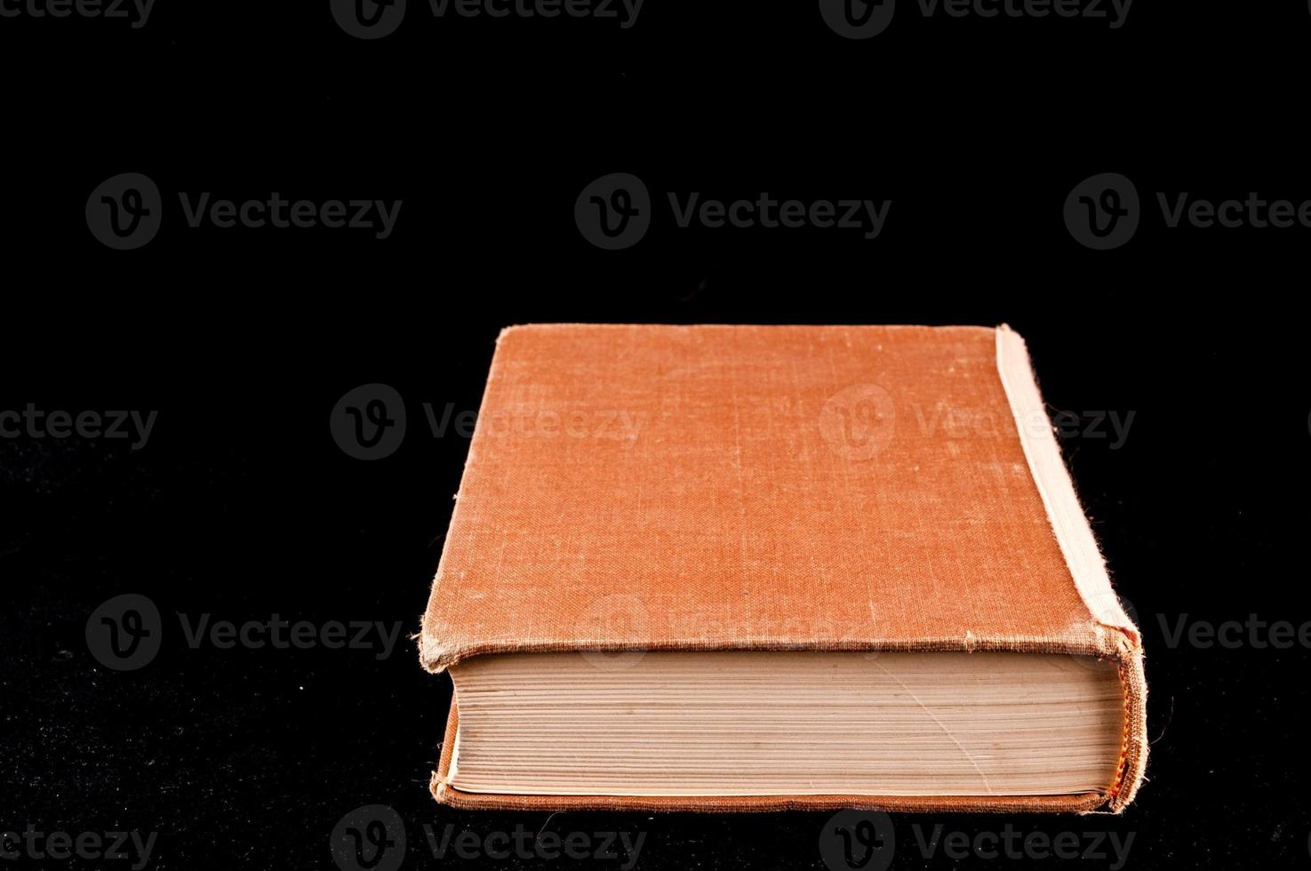Book on dark background photo