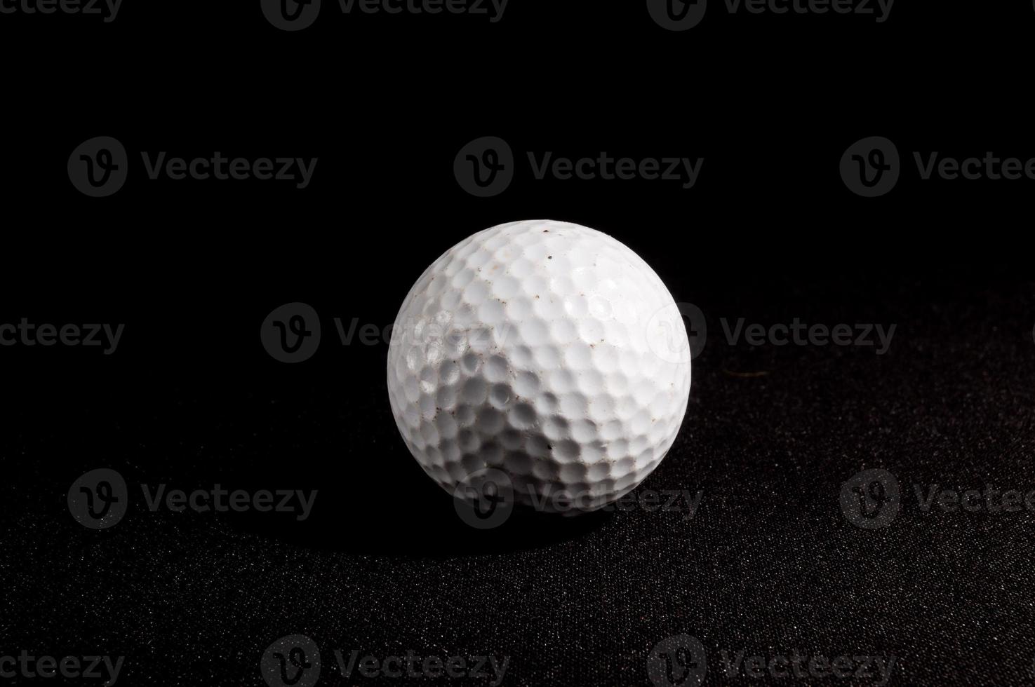 Golf ball on black background 22131833 Stock Photo at Vecteezy