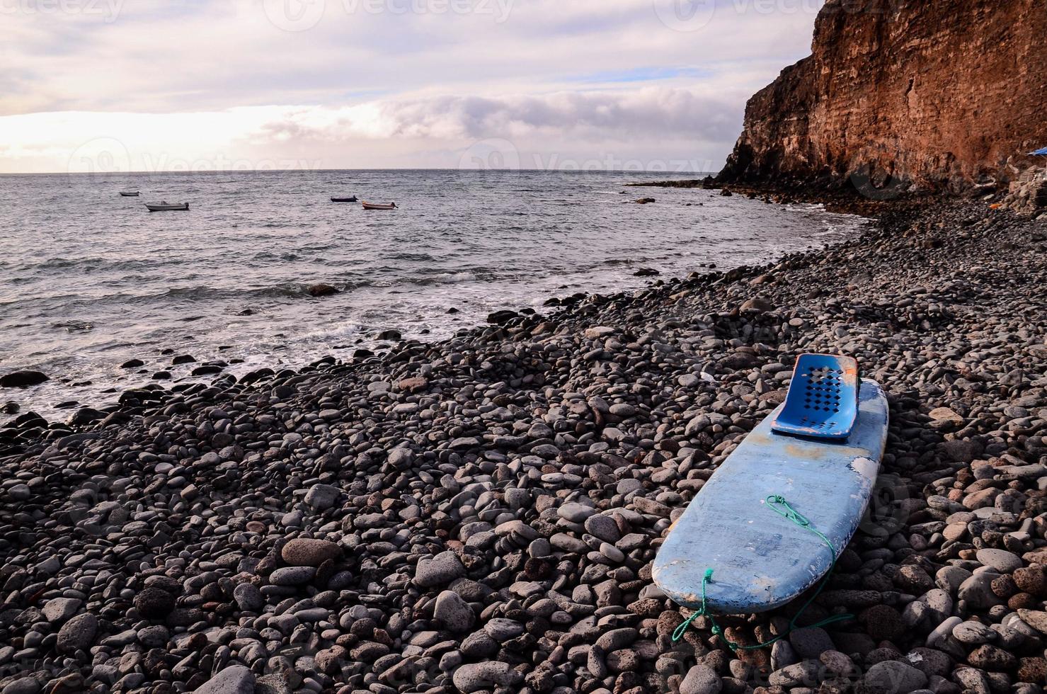 Blue boat on the beach photo