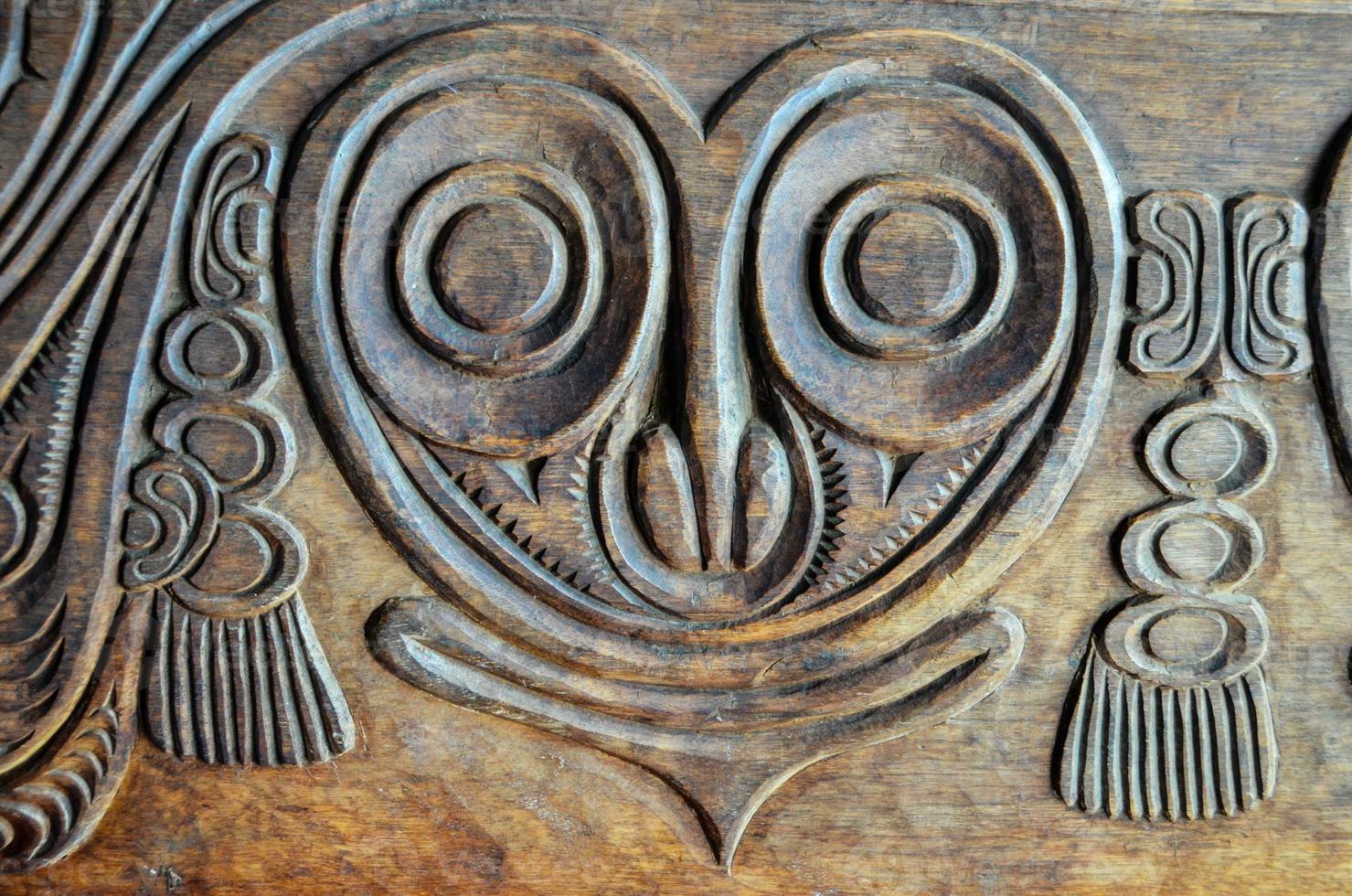 Old carved wooden board photo