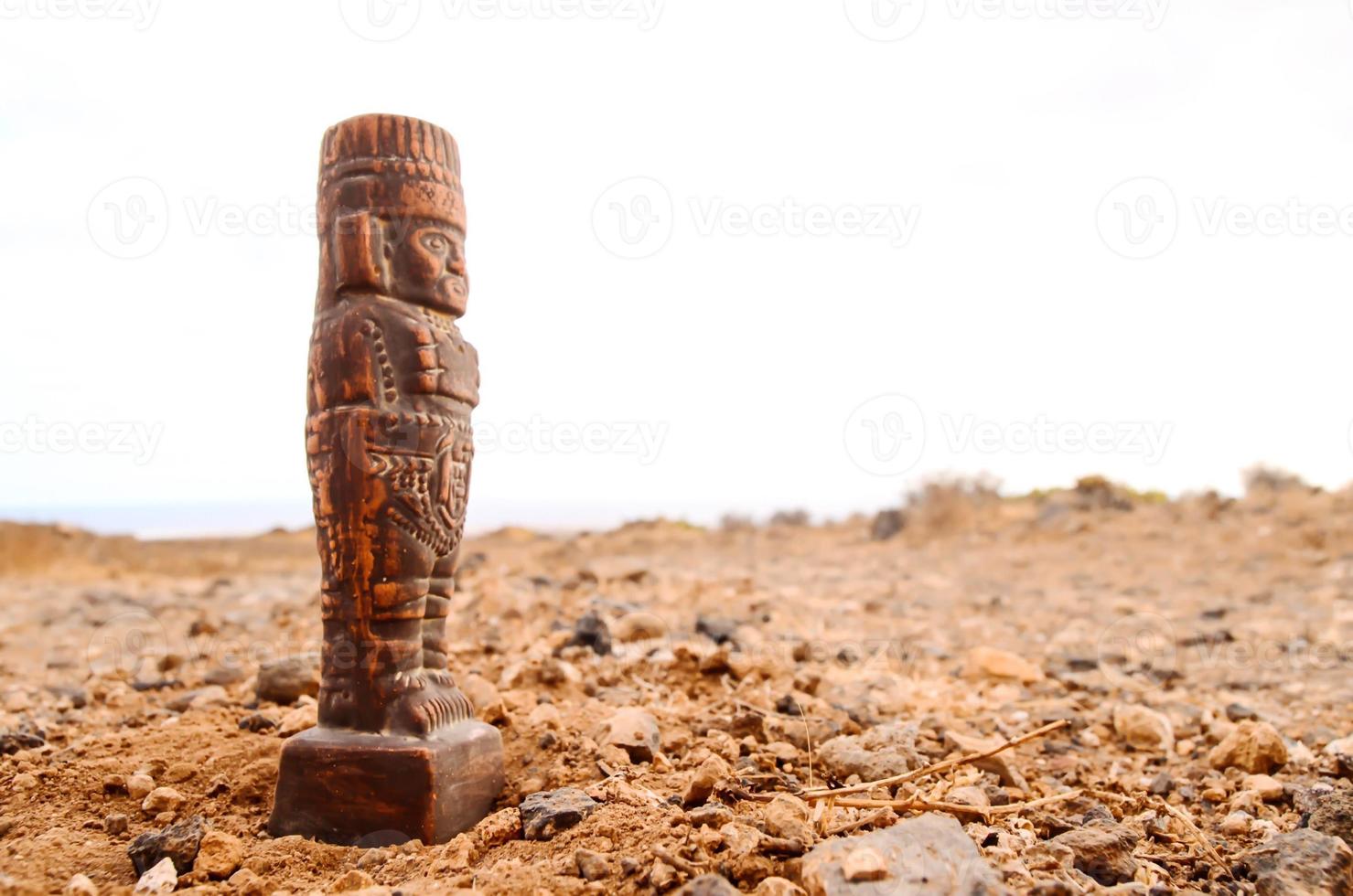 A miniature wooden statue photo