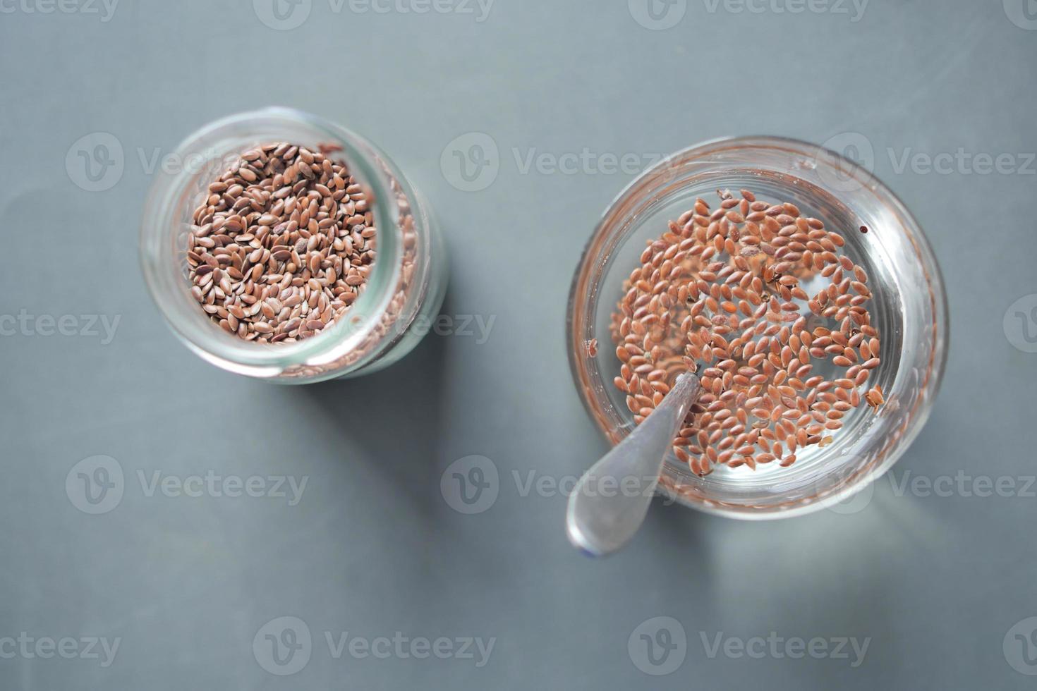 close up of chia seeds in a glass of water photo