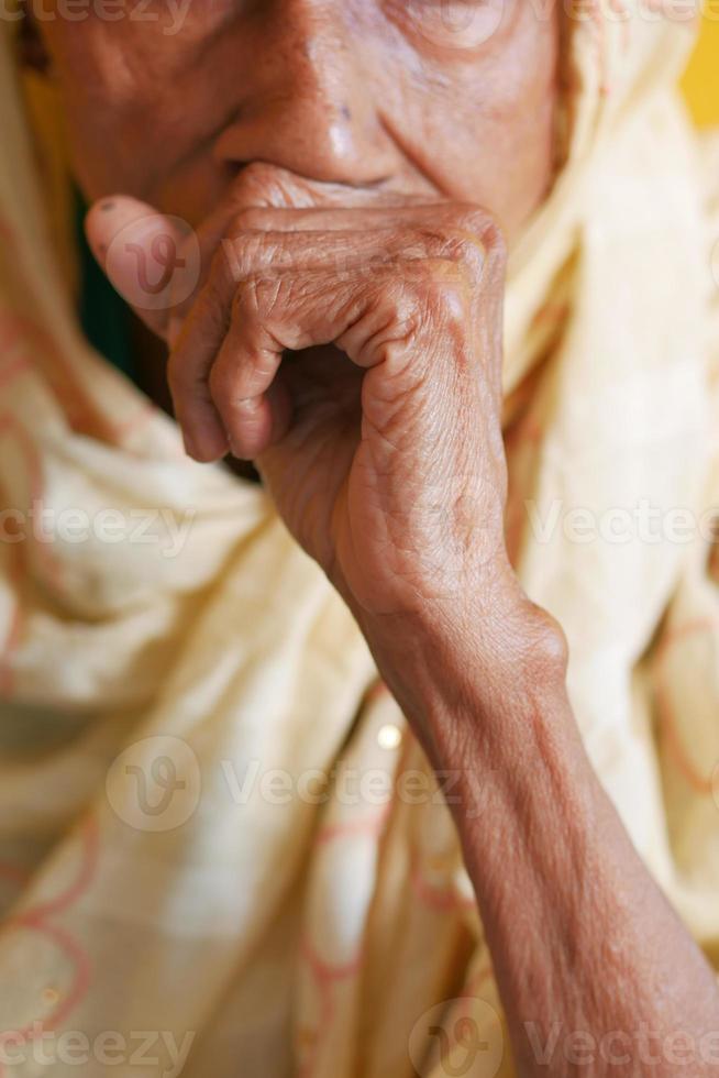 senior woman coughing and sneezes photo