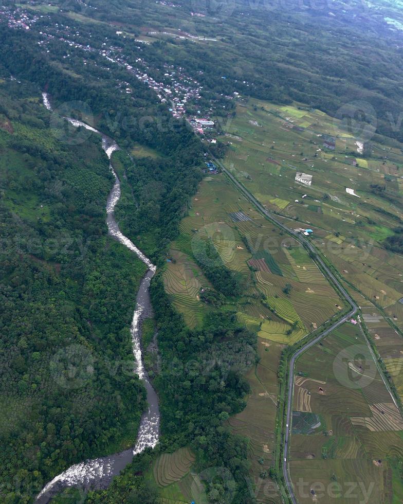 aerial view beautiful morning view from Indonesia about mountain and forest photo