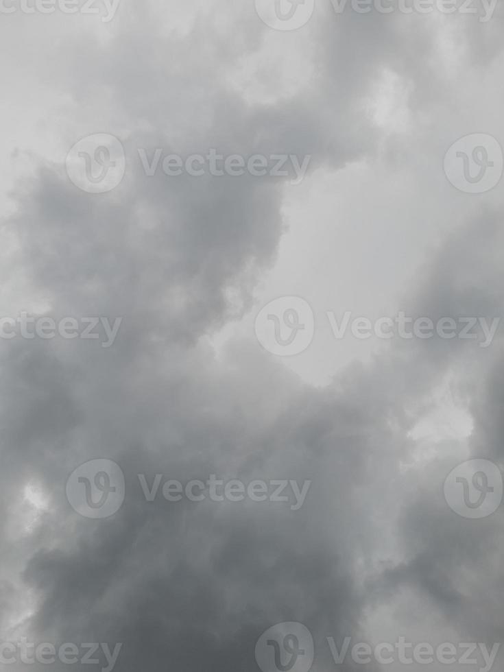 Nimbostratus clouds are dark, grey, featureless layers of cloud, thick enough to block out the
