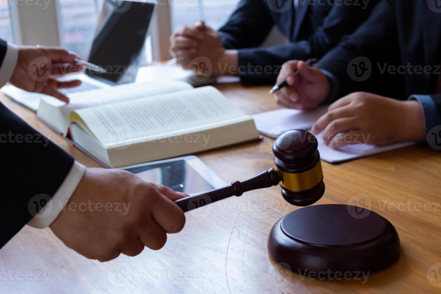 wooden judge gavel on table as symbol of justice for use in legal cases judicial system and civil rights and social justice concept with judge. concept of legislation to judge lawsuits with justice. photo