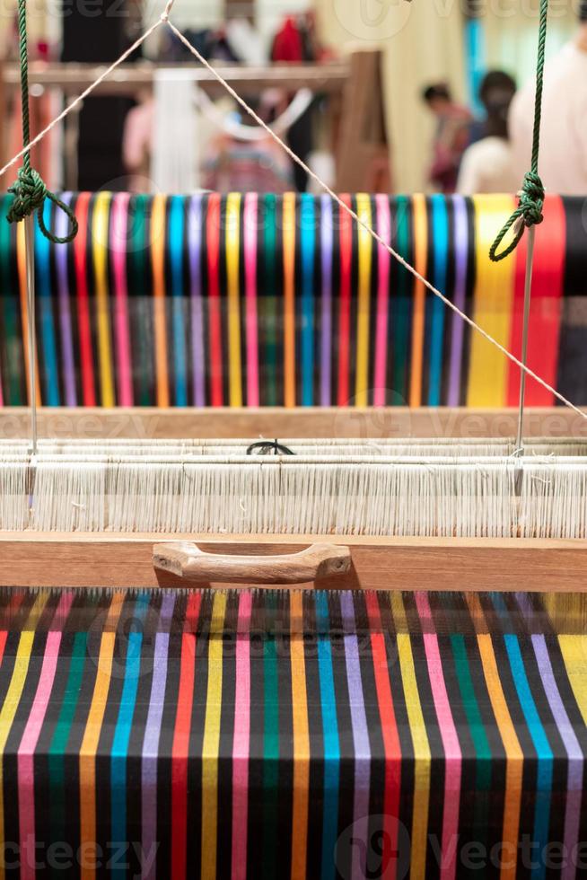 The yarn prepared inside the weaving machine is preparation for weaving local fabrics because local fabrics are handmade and have a high price because it takes quite a long time to weave. photo