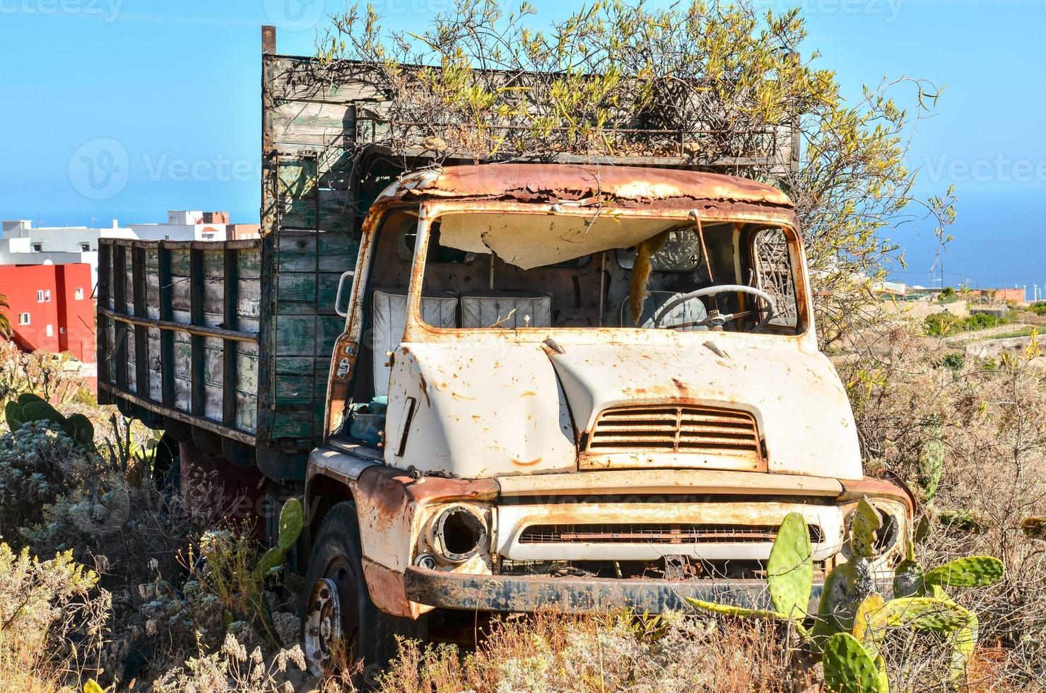 Rusty abandoned truck photo