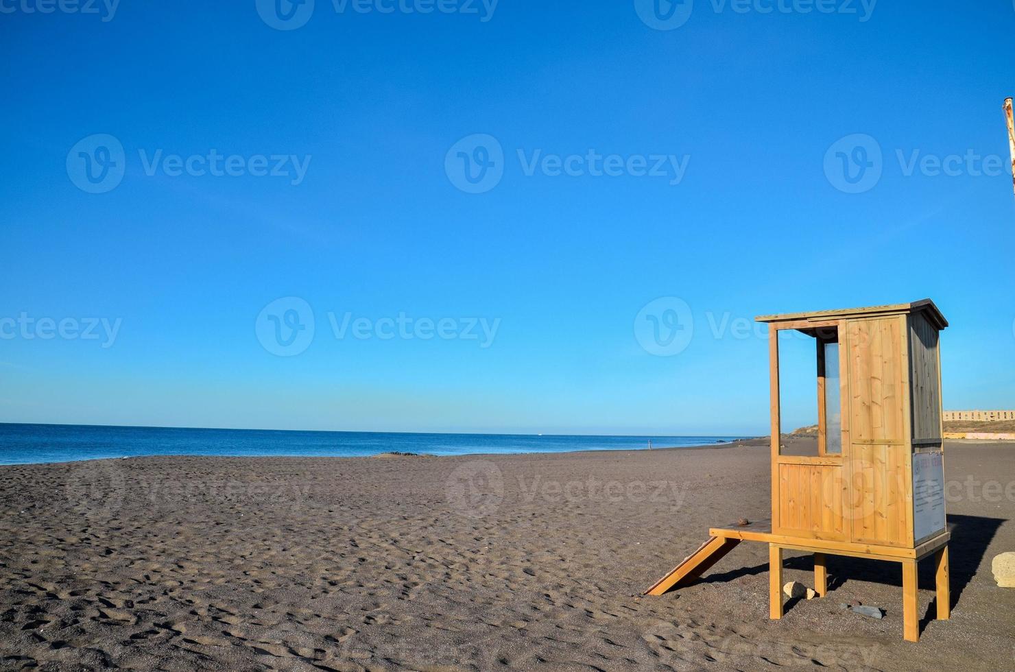 Wood booth on the beach photo