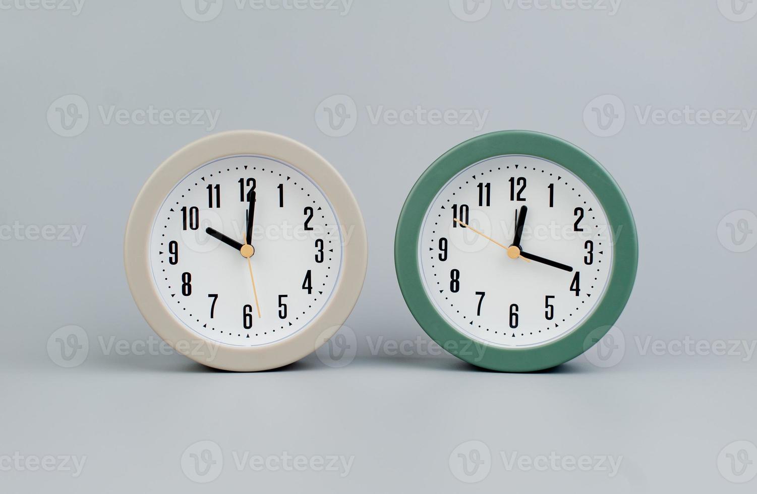 Alarm clock on gray scene, time concept operation of time When it's important to work and live photo