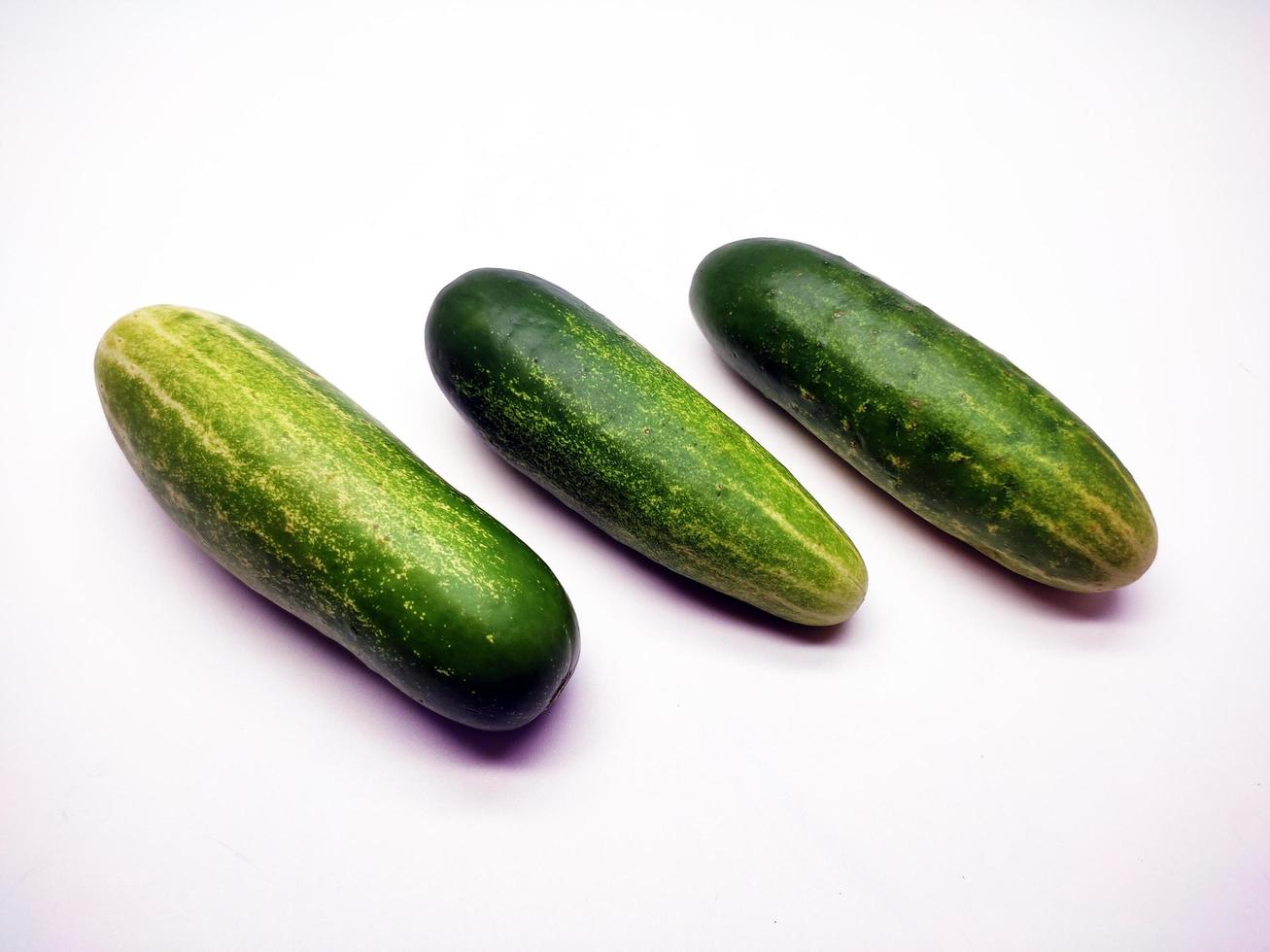 Cucumbers isolated in white background photo