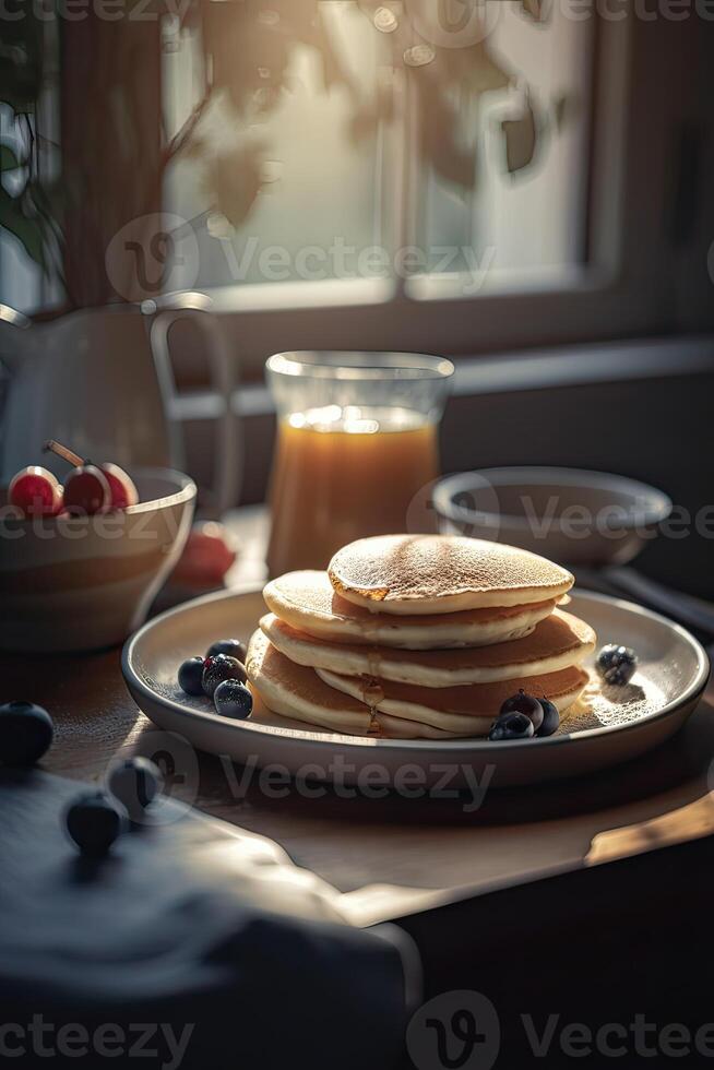 Delicious pancakes, with fresh blueberries, strawberries and maple syrup on a light background. With copy space. Sweet maple syrup flows from a stack of pancake. . photo