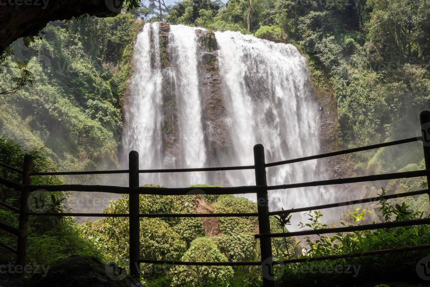 Landscape photo of great water fall on the travel destination Semarang Central Java. The photo is suitable to use for adventure content media, nature poster and forest background.